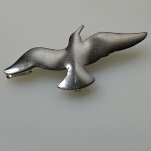 Graceful Silver-Toned Bird Brooch